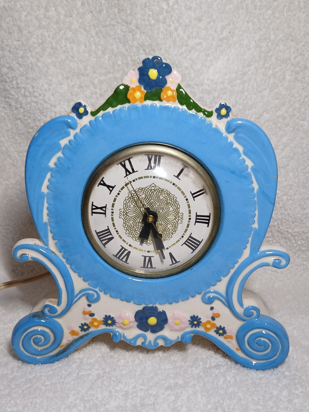 Vintage Ceramic Mantel Electric Clock Made In The Mid-to- late 20th Century.